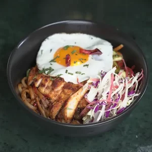 Asian Chicken Noodle Bowls Topped With A Fried Egg