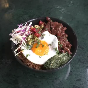 Rice With Beef And Spinach Topped With A Fried Egg